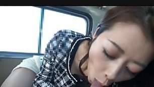 Japanese woman Maki Hojo sucks dick in a car uncensored