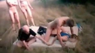 Mature fucked outdoor by a group of men