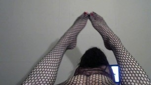 Smooth shapely tranny in fishnet pantyhose